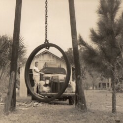 "The Fire Ring" - The fire ring was originally how the local responders were notified of a fire call. It made a loud clanging noise that could be heard throughout the little town of Melrose. Pictured is Julian V. Slade (1903-1981). Photo courtesy of Irma Jeanette Ahrano Matheny. Photographer ~ Mr. Clarence U. Ashley (1916-1987)
