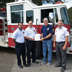 Melrose Fire Department was happy to receive a 1998 Pierce Saber custom cab fire engine from Plant City Fire Rescue, where it proudly served for 21 years.
Left to right:
Plant City Deputy Fire Chief V. Kiffner, Plant City Fire Chief D. Burnett, Melrose Fire Board President B. Brown, and Melrose Fire Chief K. Mobley